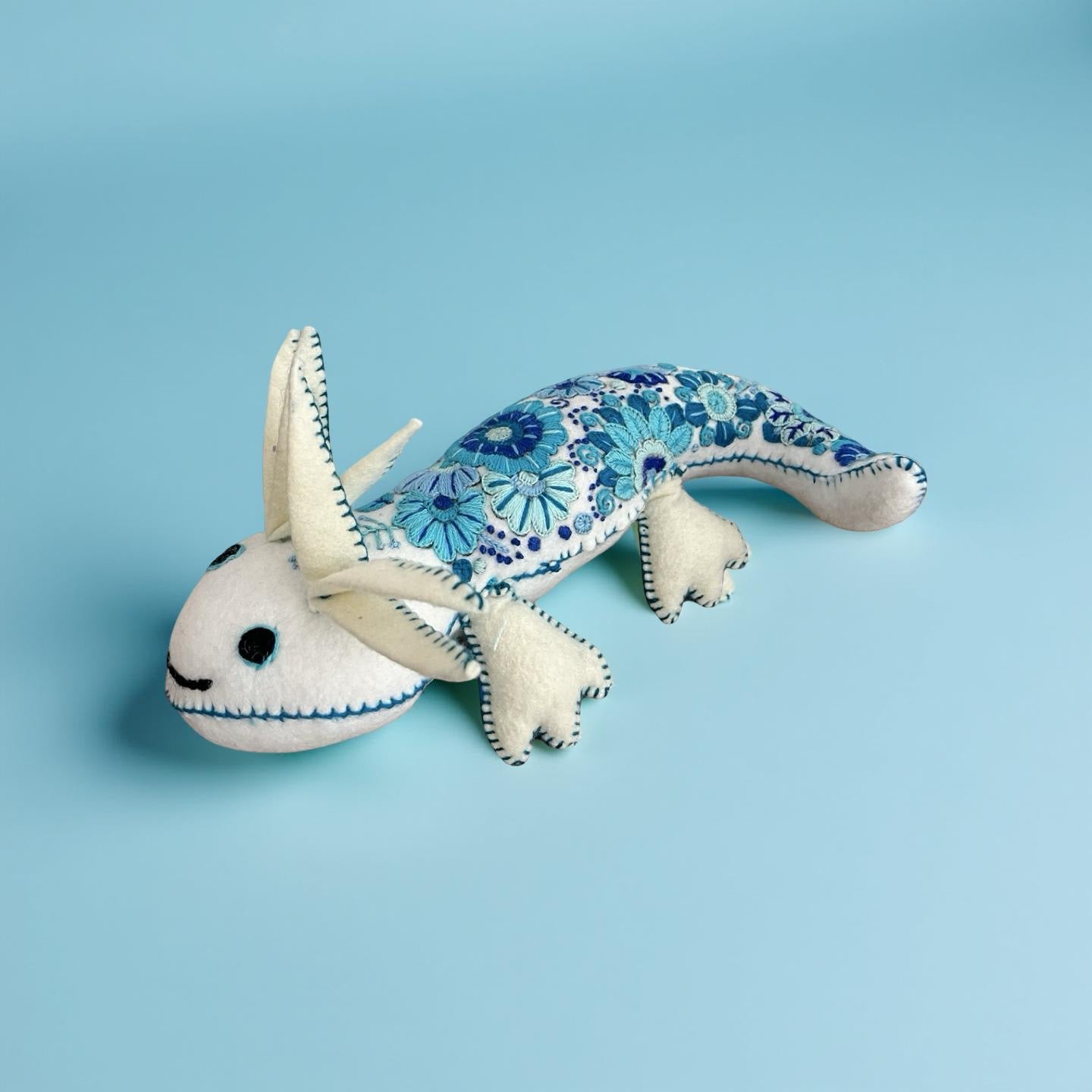 Embroidered felt ajolote